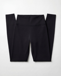Front flat lay view of the LOAR black seamless leggings, highlighting the high-waisted design. Premium alternative activewear.