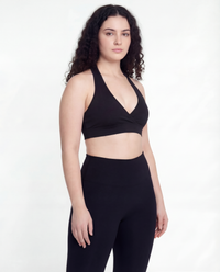 Front angle view of the LOAR black seamless leggings, highlighting the high-waisted fit. Premium alternative activewear